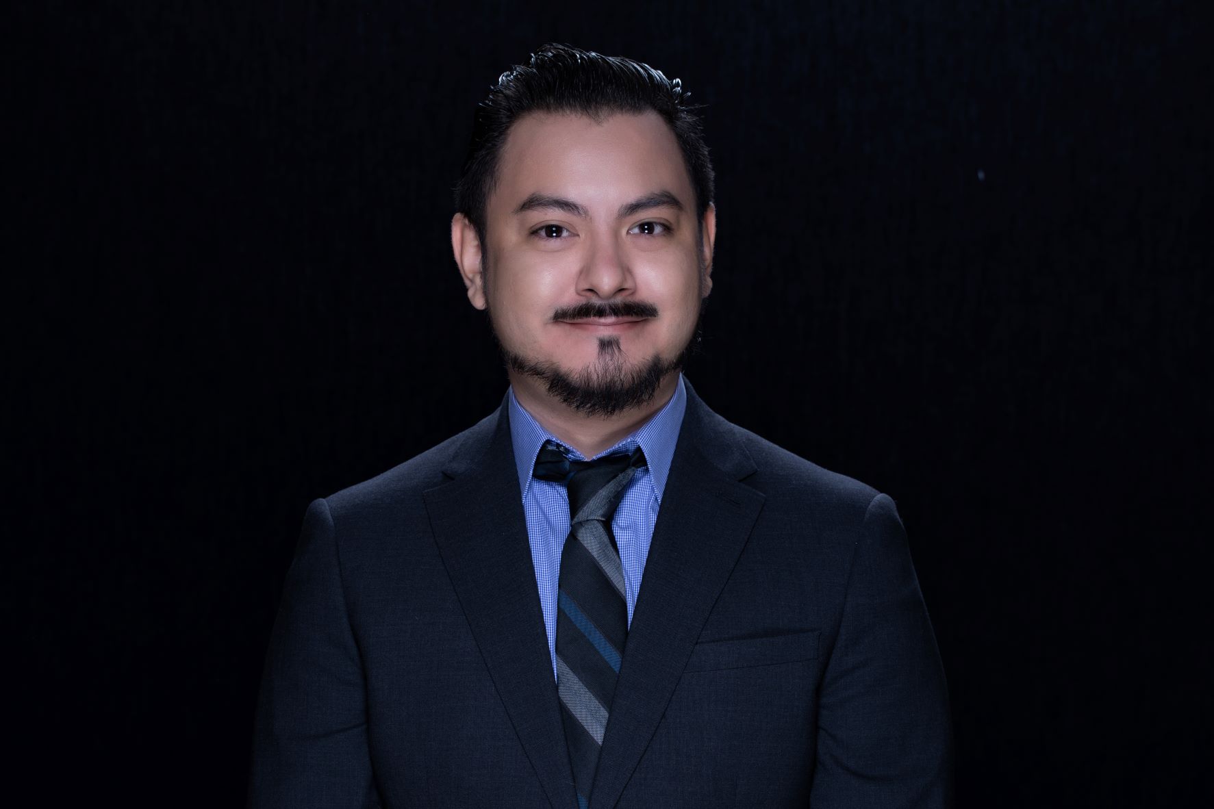 Professional portrait of Miguel Rodriguez